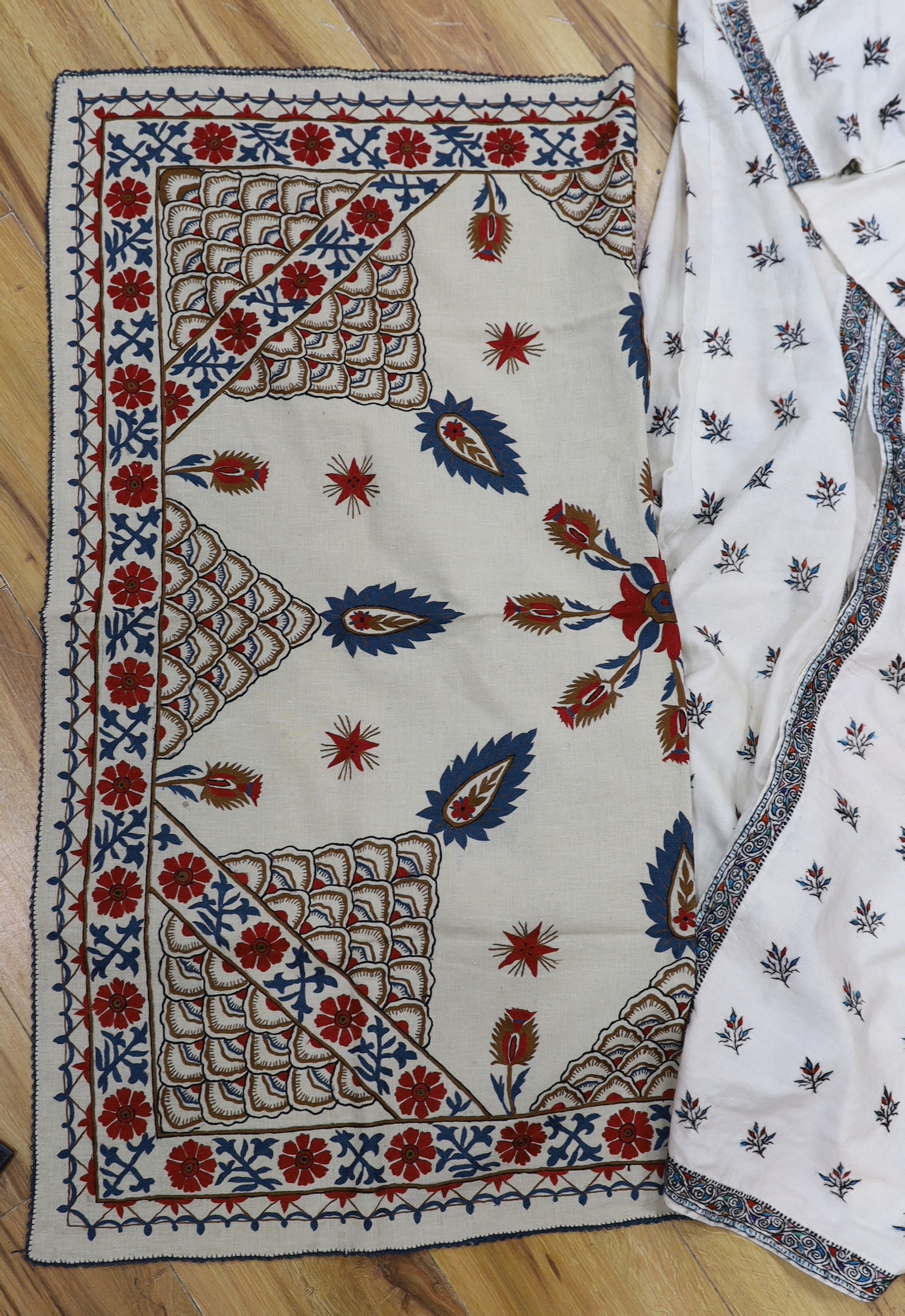 An Indian embroidered sari, similar robe Suzani style embroidered coat